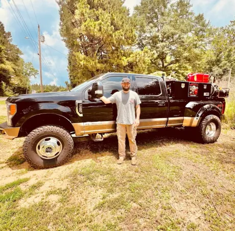 Breaux's Roadside owner-operator with service vehicle, ready for commercial truck tire service